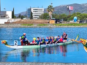 Dragon boat team on water